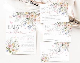 May include: Baby shower invitation with floral design. The invitation says "Baby in Bloom" and includes the names "Sarah & Anthony" and the date "Sat Aug 23 | 3PM". There are also cards for a diaper raffle and a book request.