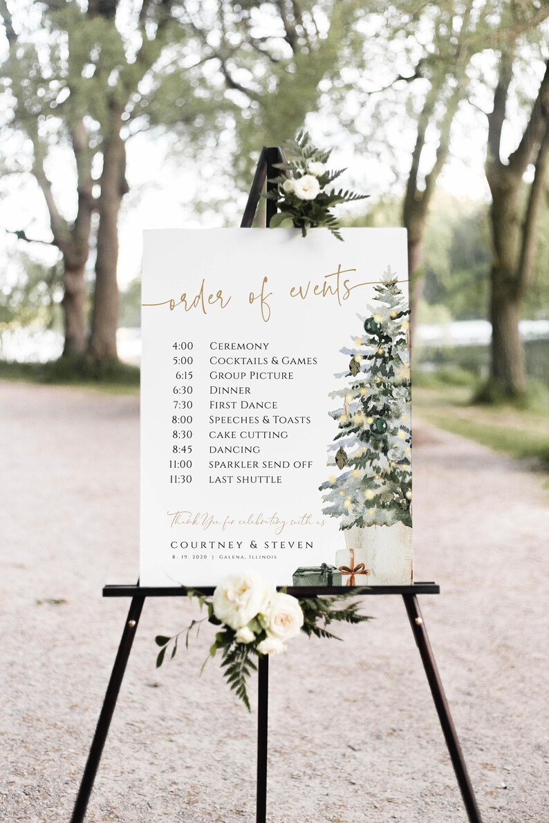 May include: A white sign with a watercolor illustration of a Christmas tree and presents. The sign lists the order of events for a wedding reception, including the ceremony, cocktails, dinner, and dancing. The text reads "order of events" and "Thank You for celebrating with us Courtney & Steven 8.19.2020 Galena, Illinois".