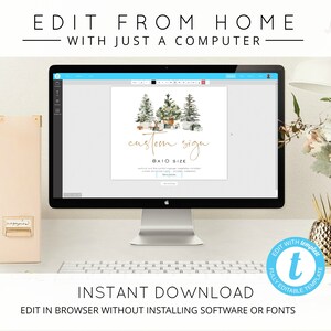 Peut inclure: Un &eacute;cran d'ordinateur affichant un mod&egrave;le de conception num&eacute;rique pour une enseigne personnalis&eacute;e avec une illustration aquarelle d'une sc&egrave;ne de for&ecirc;t d'hiver. Le texte &agrave; l'&eacute;cran indique "custom sign 8x10 size". L'&eacute;cran est sur un bureau avec un clavier, un objet d&eacute;coratif en forme d'ananas dor&eacute; et un bouquet de fleurs roses.