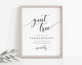 May include: A white framed sign with black text that reads "guest tree". The text below says "Please leaf your fingerprint and sign your name to help us remember our special day".