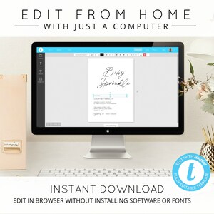 May include: A computer screen displaying a baby sprinkle invitation template on a website. The text on the screen reads "Baby Sprinkle". The screen is on a desk with a keyboard, a gold pineapple vase with flowers, and two beige file folders.