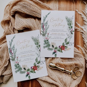 May include: A wedding invitation with a watercolor wreath of greenery, berries, and flowers. The invitation is for Courtney and Anthony's wedding on December 17th at The Stables Inn in Galena, Illinois.