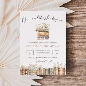 May include: A white bridal shower invitation with a floral illustration of a stack of books. The text reads "Our next chapter begins" and includes details about the event, including the date, time, location, and RSVP information. The invitation also includes the text "registered at Target".