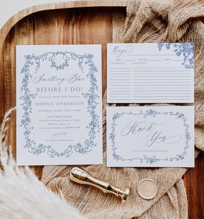 May include: A set of three blue and white floral themed cards for a bridal shower. The first card is an invitation with the text "Something Blue Before I Do!" and the bride's name. The second card is a recipe card with the text "Recipe" and blank lines for ingredients and directions. The third card is a thank you card with the text "Thank You" and "From the McDonalds".