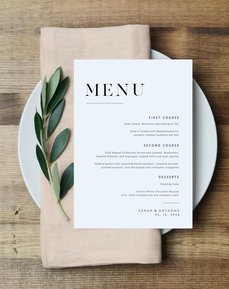 May include: A wedding menu with a light blue background and black text. The menu lists the first course, second course, and desserts. The menu is titled "MENU" and includes the names "Sarah & Anthony" and the date "05. 12. 2014".