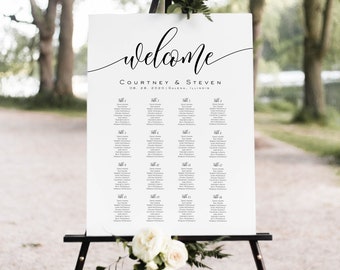 Puede incluir: Un diagrama de asientos de boda blanco con texto negro. El diagrama está en un caballete y tiene las palabras "Bienvenido, Courtney & Steven, 08.28.2020 | Galena, Illinois" en la parte superior. El diagrama enumera las mesas del 1 al 16 con los nombres de los invitados.