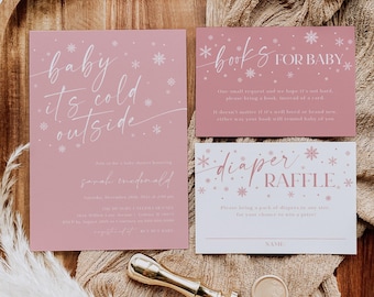 May include: Pink and white baby shower invitation with a winter theme. The invitation says "baby it's cold outside" and includes snowflakes. There is also a pink and white card that says "books for baby" and a pink and white card that says "diaper raffle".