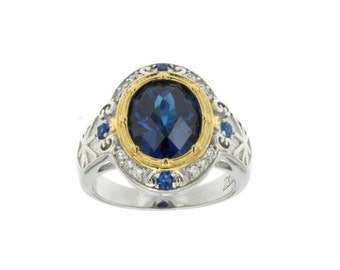 Silver Ring With Man Made Crystal Sapphire Center Stone CZ