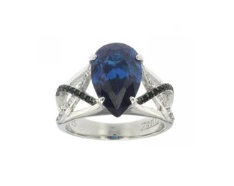Silver Ring With Man Made Crystal Sapphire Center Stone CZ
