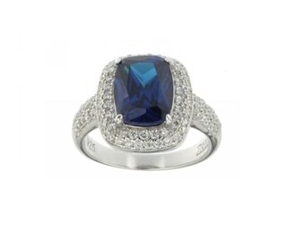 Silver Ring With Man Made Crystal Sapphire Center Stone CZ