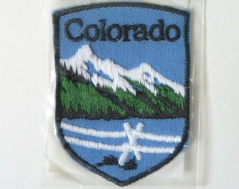 Vintage Colorado Travel Patch Featuring a Rocky Mountains Scene - Voyager Originals Souvenir Patch