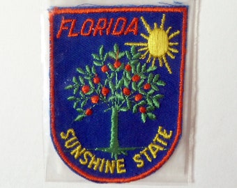 Vintage Travel Patch for the State of Florida Featuring the Sun and an Orange Tree - Voyager Originals Souvenir Patch