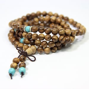 108 Wood Mala Natural Agarwood Mala 6mm 8mm Brown Wood Mala Necklace Sandalwood Turquoise Beaded Wrap Bracelet Buddha Prayer Meditation Bead