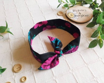 Organic cotton jersey, Black Knot bow hair band with a bright pink floral pattern.  Headwrap headband. Top knot headband. Bow headband.
