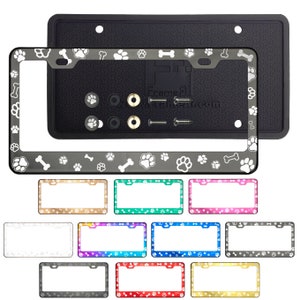 May include: License plate frames with paw prints and bone designs in various colors. The frames are shown with mounting hardware and a black rubber backing. Additional frames in different colors are displayed below.