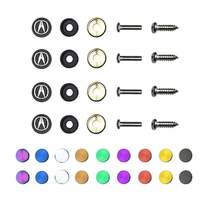 May include: A set of 10 replacement emblems for a car, featuring a silver Acura logo on a black background. The set also includes 10 gold-colored washers, 10 black washers, and 10 silver screws.