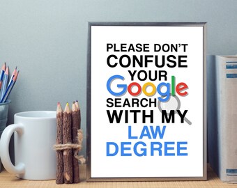 May include: A white framed print with the text "Please don't confuse your Google search with my law degree." The text is in black with the word "Google" in colored letters.