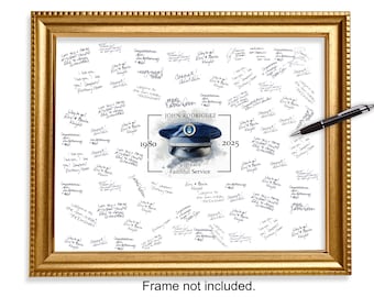 May include: A framed print with a gold-colored frame. The print features a watercolor illustration of a military hat, the name "JOHN RODRIGUEZ", and the years 1980-2025. The background is filled with handwritten messages. A pen rests on the frame.