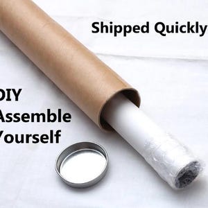 May include: A brown cardboard tube with a white paper roll inside. The tube is labeled "DIY Assemble Yourself". The text "Shipped Quickly!" is visible in the background.