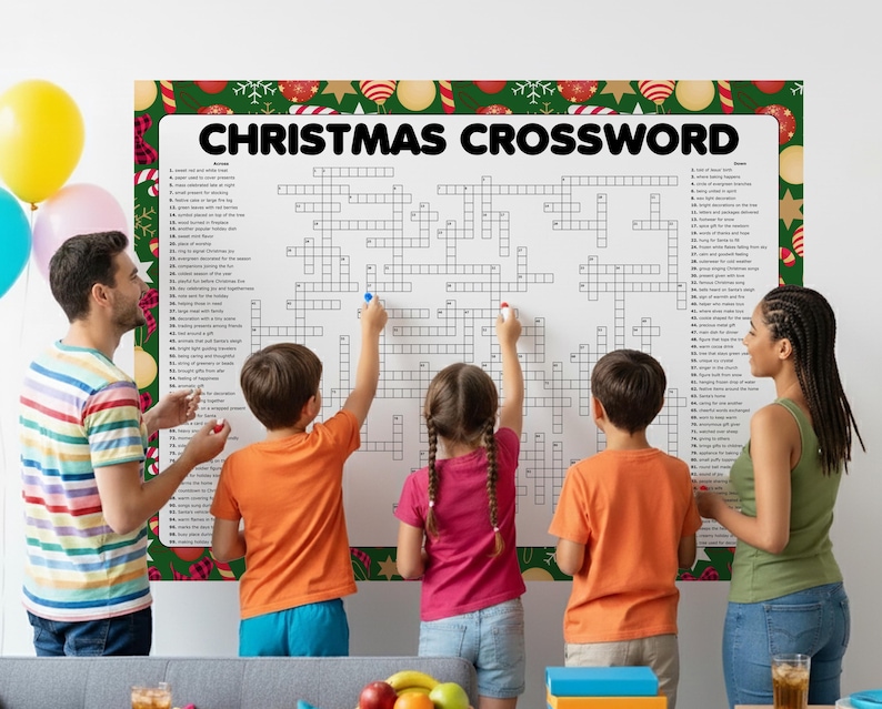 Op de afbeelding: Een grote kerstpuzzel met een feestelijke rand van ornamenten en hulst. De titel "CHRISTMAS CROSSWORD" staat prominent weergegeven. Verschillende mensen staan rond de puzzel, sommigen houden stiften vast, wat duidt op een gezamenlijke activiteit. Ballonnen zijn zichtbaar op de achtergrond.