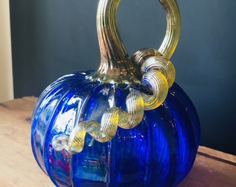 Cobalt blue jewel tone hand blown glass pumpkin with iridescent gold stem