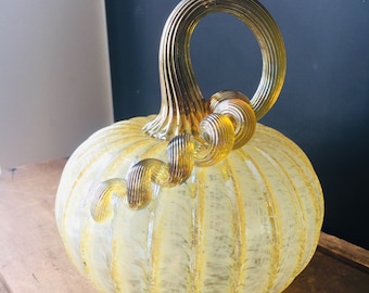 Iridescent ivory hand blown glass pumpkin with iridescent gold stem