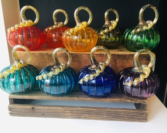 Jewel tone rainbow hand blown glass pumpkins with golden stems