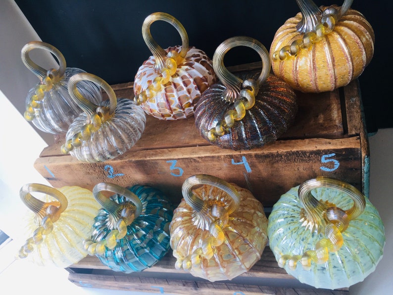 Clear round hand blown glass pumpkin with iridescent gold stem image 3