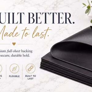 The image is an advertisement for a product that claims to be "built better." It features a stack of black, flexible, and built-to-last paper sheets, along with a leaf and a heart symbol. The text highlights the product's premium full-sheet backing for a secure, durable hold.