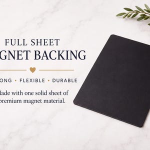 a black magnetic backing with text describing its features, such as being made with one solid sheet of premium magnet material and having a full sheet backing.
