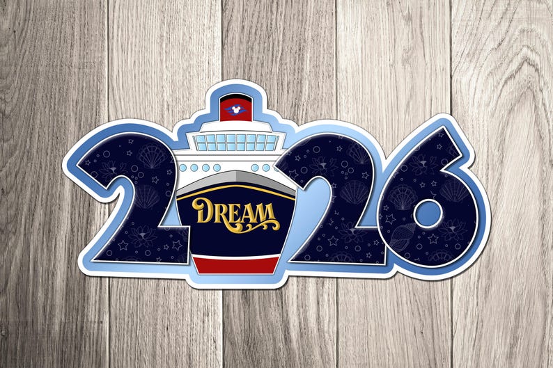 A sticker with the number "26" and a ship design, representing the year "2016".
