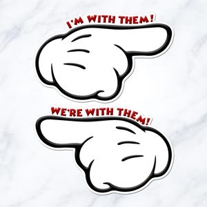 two cartoon-style hand stickers with the text "I'm with them!" and "We're with them!" written above them.