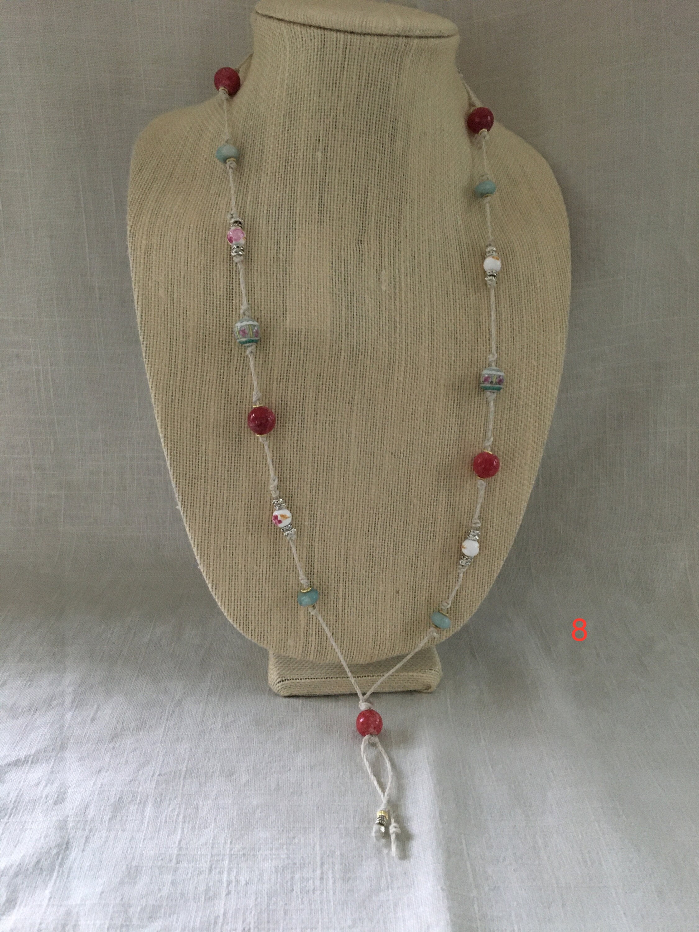 Popular knotted beaded necklaces with gold and silver accents. | Etsy