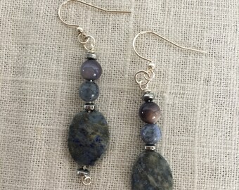 Blue oval and round  kyanite beads with silver highlights drop earrings.