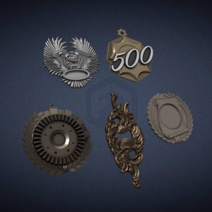 May include: Five different metal medallions with various designs. One medallion features a stylized engine with wings, another has the number 500, a third has a circular design with a gear, a fourth has a floral design, and the last has a circular frame with a blank center.