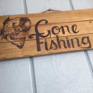 Gone fishing sign