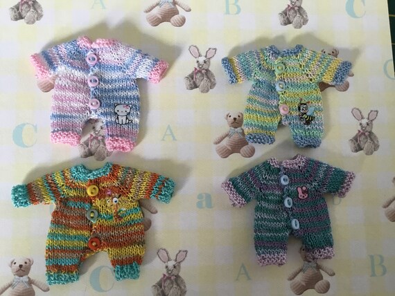 knitted baby grow