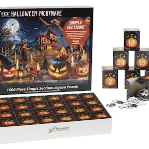 May include: A 1000 piece Halloween Nightmare jigsaw puzzle with a spooky scene of a haunted house, jack-o-lanterns, and a full moon. The puzzle is made up of 24 sections, each with a number on it. The puzzle is in a box with a picture of the completed puzzle on the front.