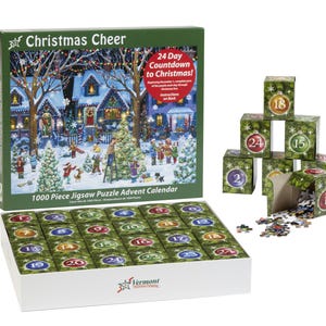 May include: A Christmas-themed jigsaw puzzle advent calendar. The box features a winter scene with houses, trees, and people. The set includes 24 numbered boxes, each containing puzzle pieces. The puzzle is 1000 pieces.