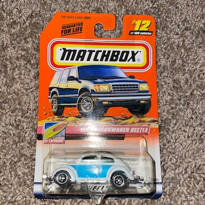 1962 VW Coccinelle n°12 Volkswagen Bug 2 tons Matchbox série 2000 à la plage