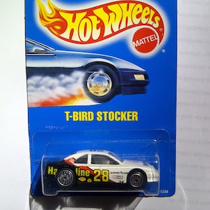 Hot Wheels #88 Ford T-Bird Stocker Havoline novo em cartão todo azul