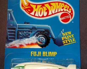 Hot Wheels #249 Fuji Blimp new on all blue card
