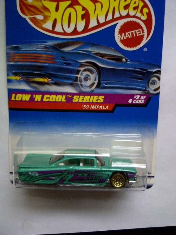 Hot Wheels #698 1959 Chevy Impala New on Card UK