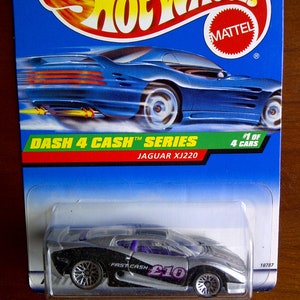 Hot Wheels Jaguar XJ220 Dash 4 Kassier neu auf Karte