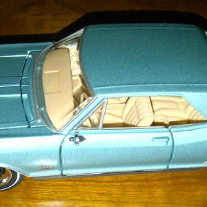1965 Buick Riviera Green 1/26th Diecast New no box