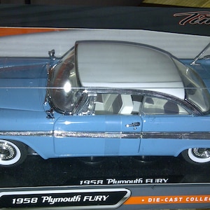 1958 Plymouth Fury Blue 1:18TH Diecast New in Box