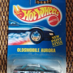 Hot Wheels #265 Olds Aurora Polizeiauto neu auf blauer Karte