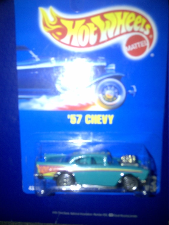 Hot Wheels 213 1957 CHEVY all blue card new on card no tampo on door