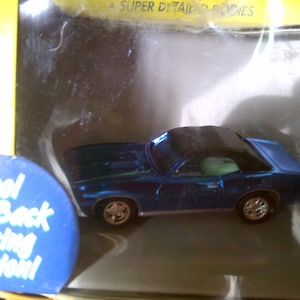 Aurora Thunder-Jet Ho Slot Car Jl Pontiac GTO Body with new old stock chassis