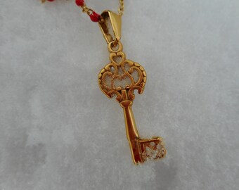 "mysterious key" pendant necklace, golden stainless steel